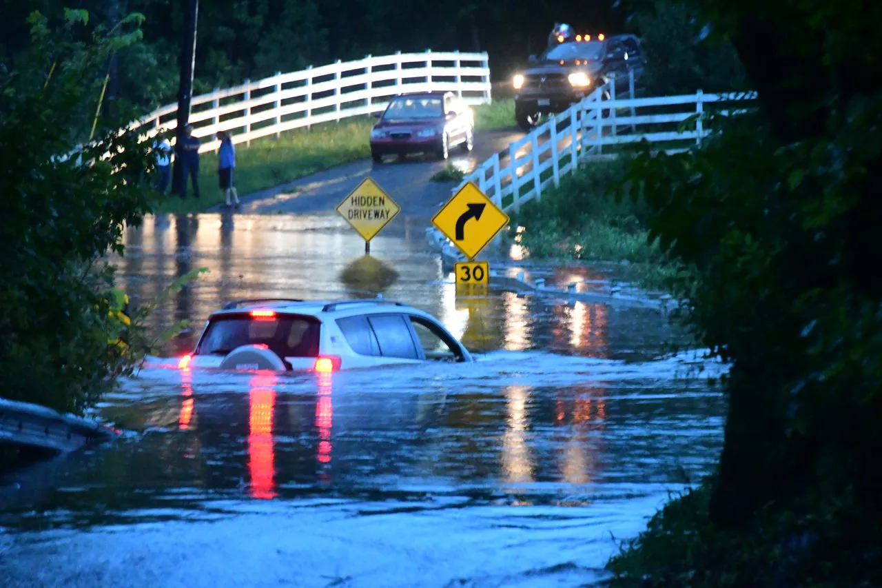 Neighbors in New Jersey Suburb Affected by Flooding Pitch in to Help One Another